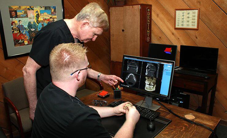 Drs. Stephen and Franklin Boyles checking x-rays